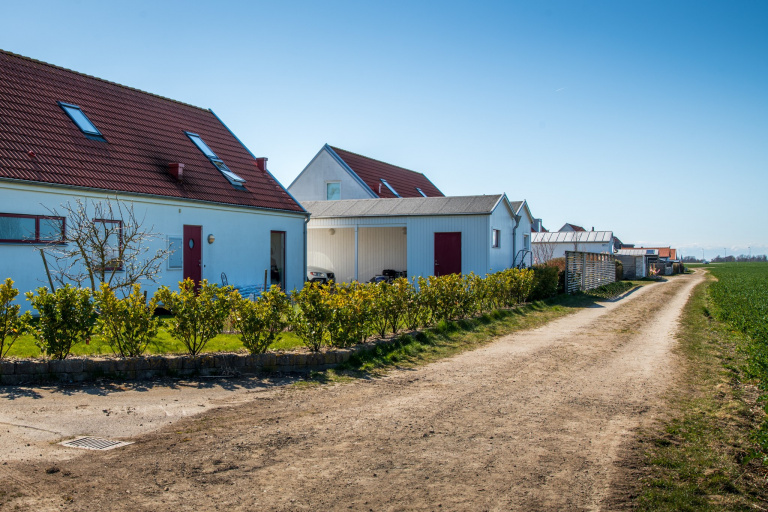 Markanvisning Västervång, villor längs grusväg