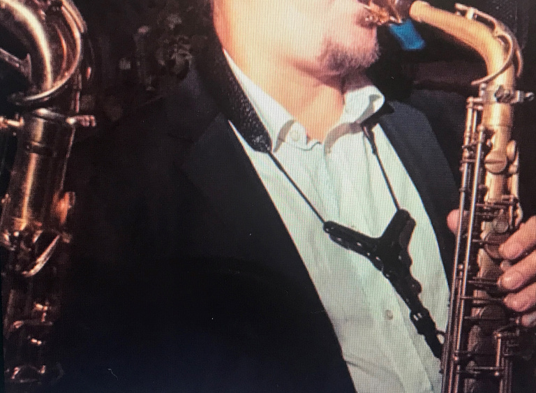 Person med saxofon
